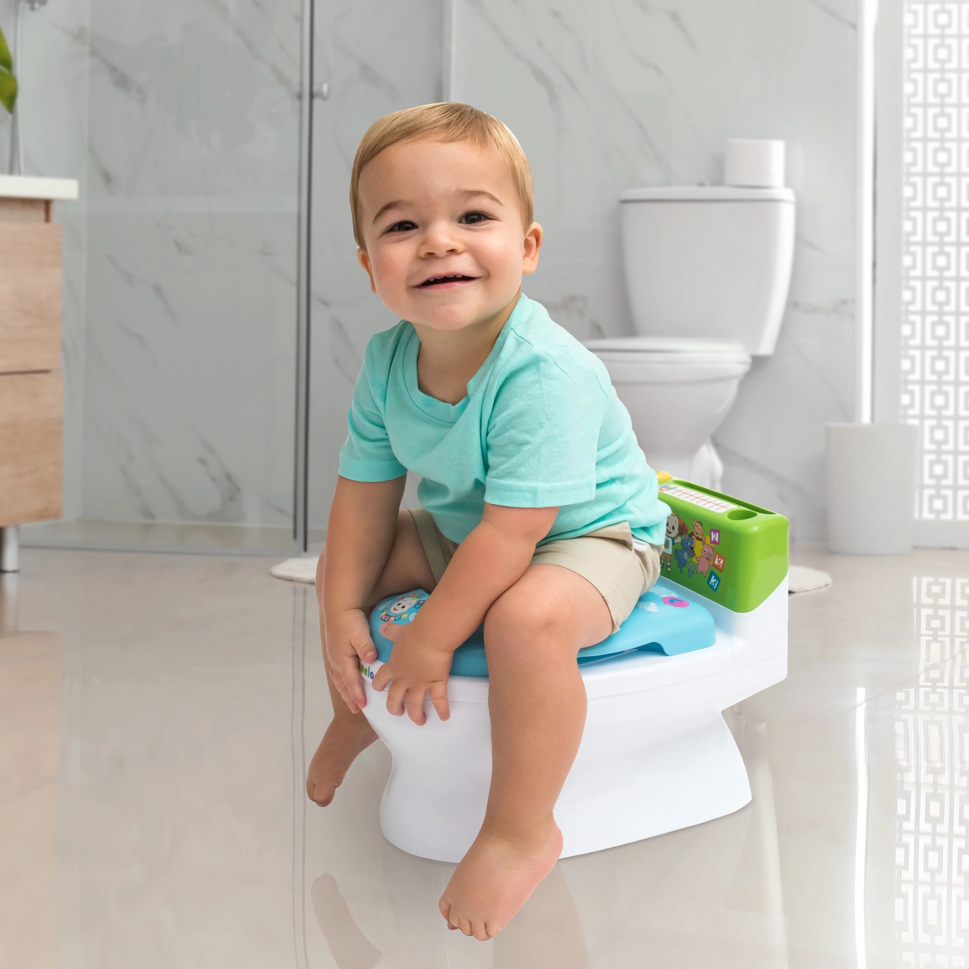 Musical Transition Potty Trainer with Splash Guard and Storage L90453